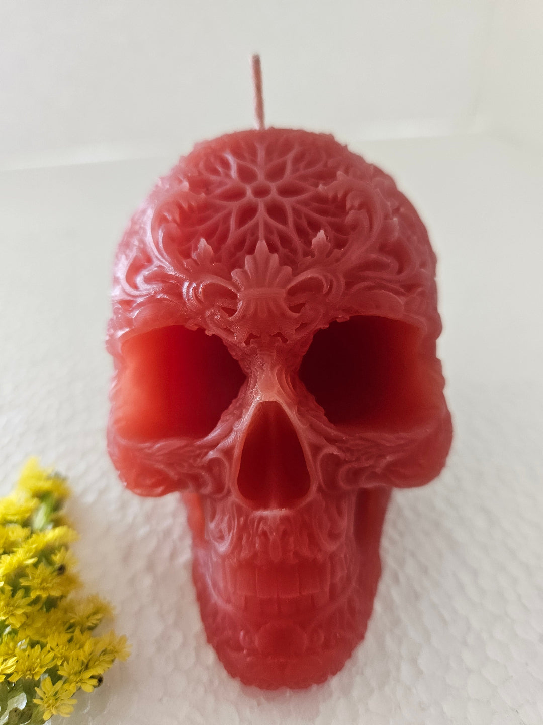 Star forehead skull candles with intricate detail