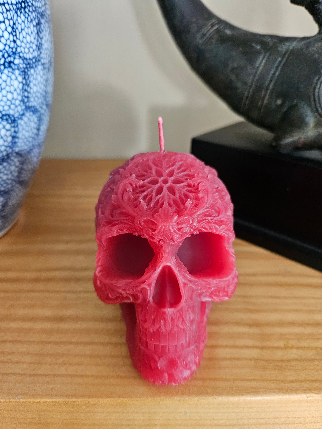 Star forehead skull candles with intricate detail
