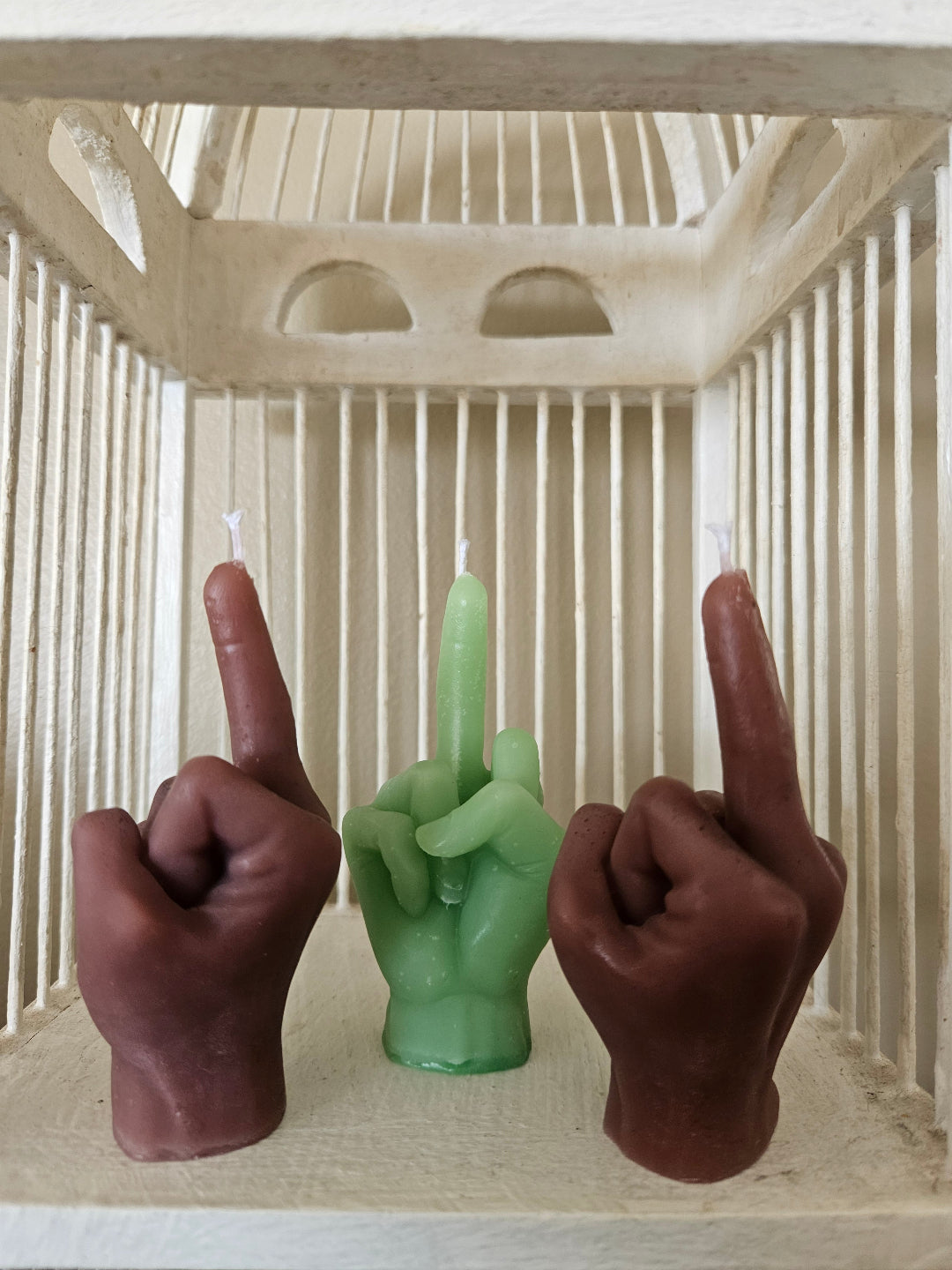 Defiance candles "Flipping the bird"