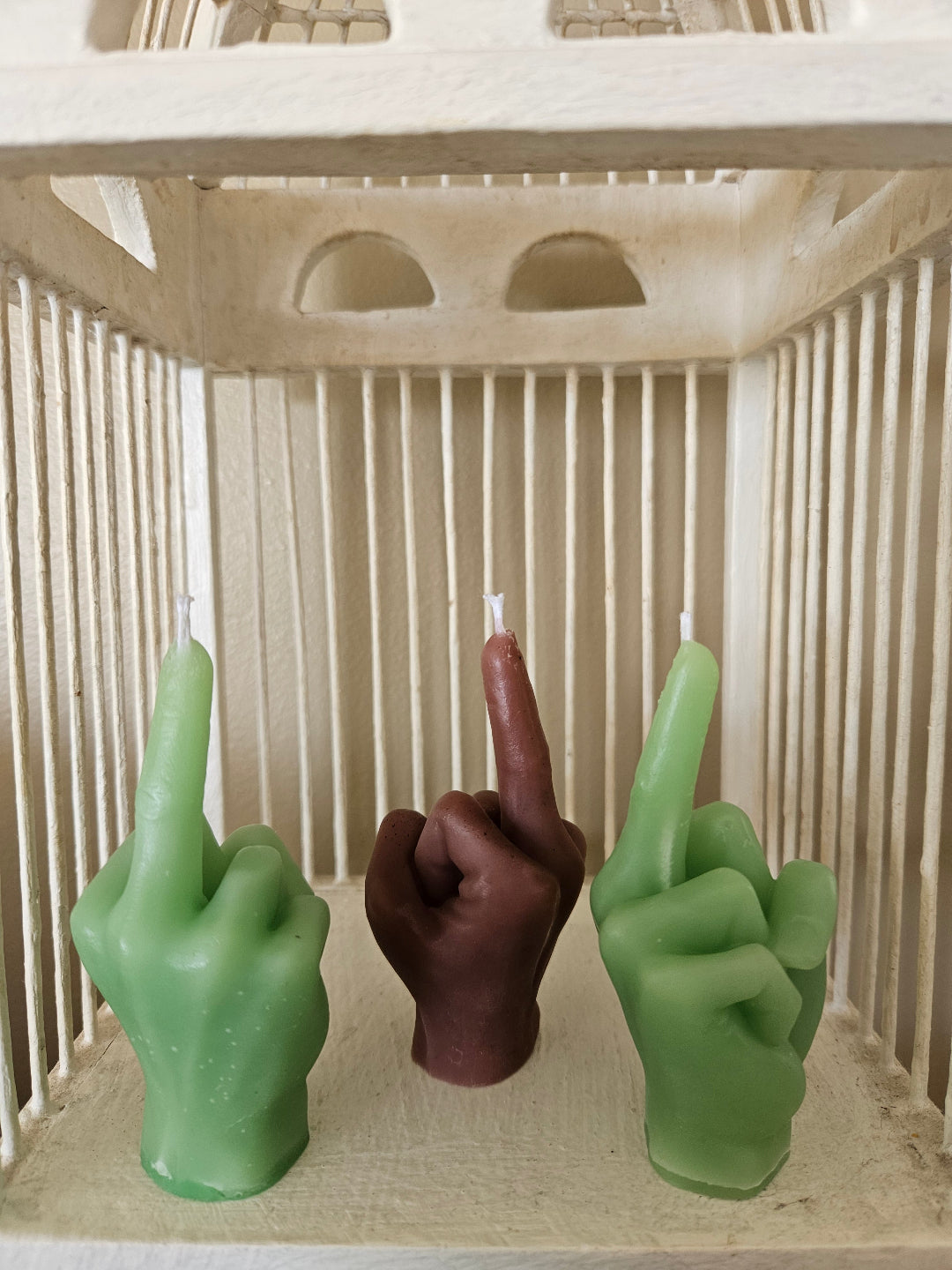 Defiance candles "Flipping the bird"
