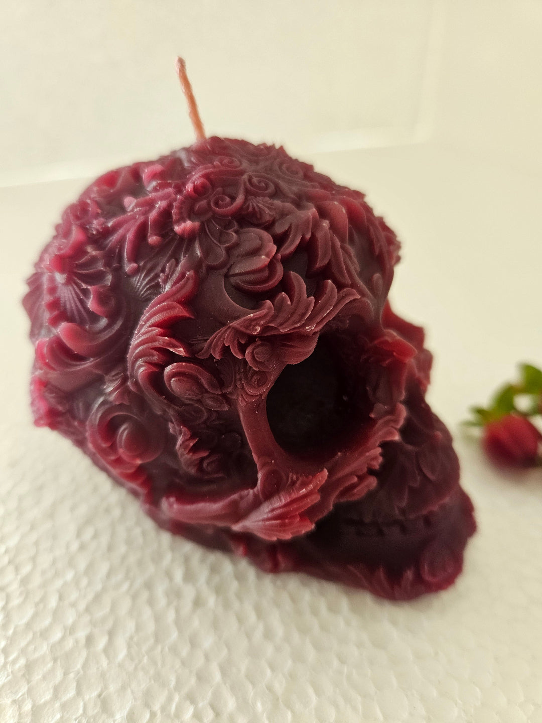 Floral detail skull candles - scented