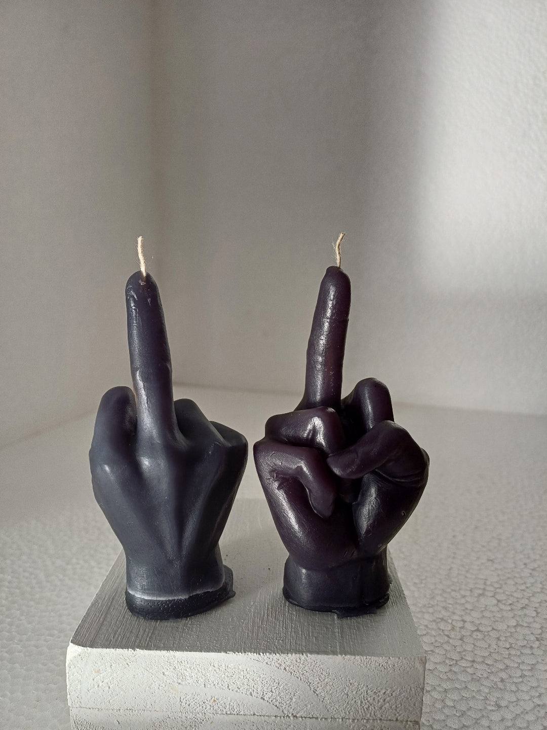 Defiance candles "Flipping the bird"