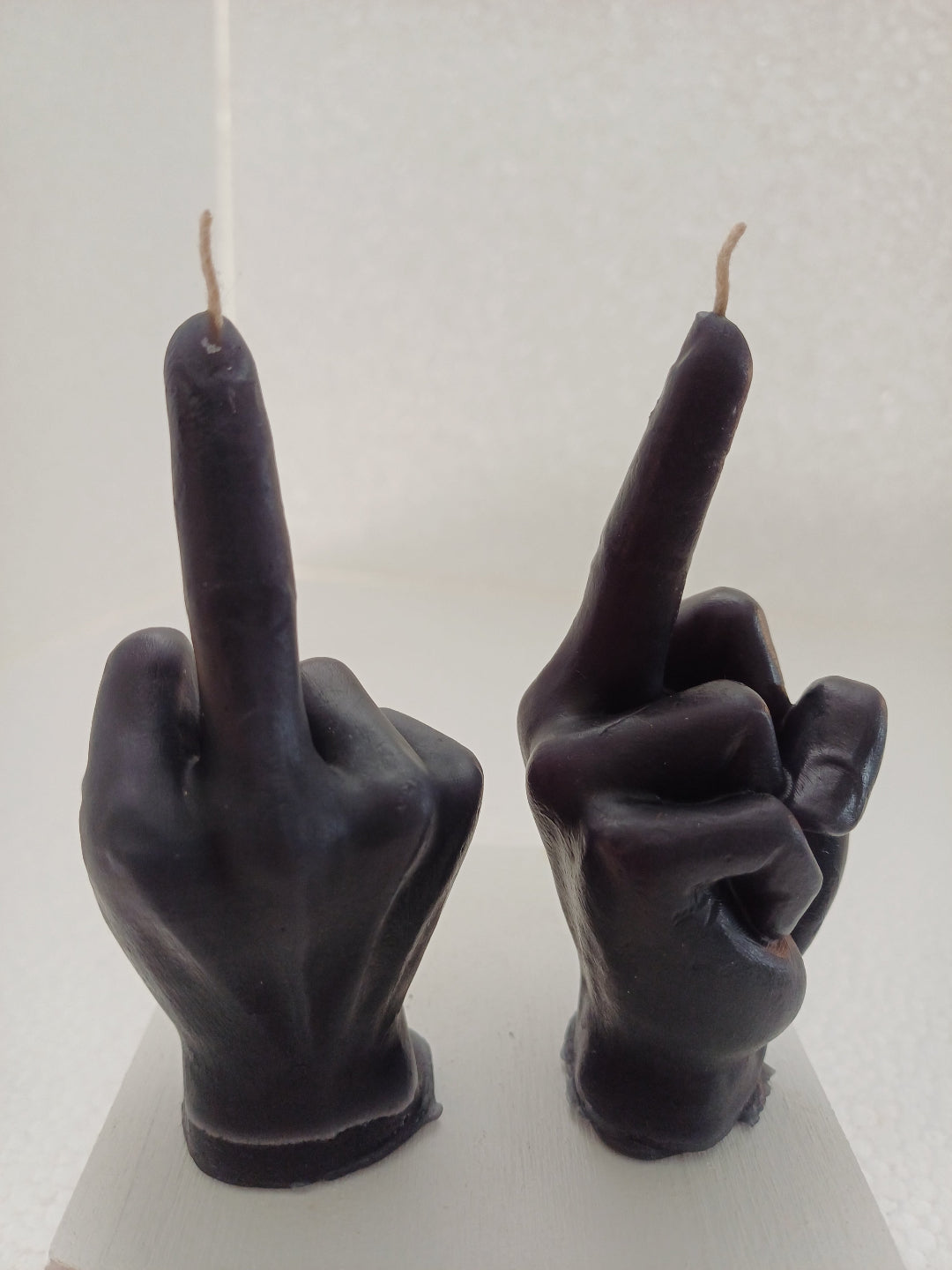 Defiance candles "Flipping the bird"