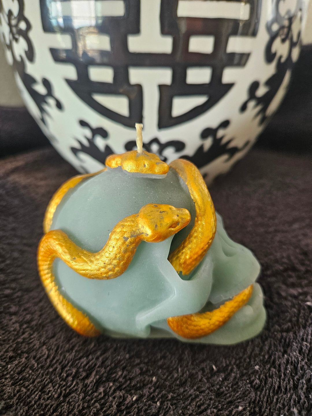Serpent skull candles
