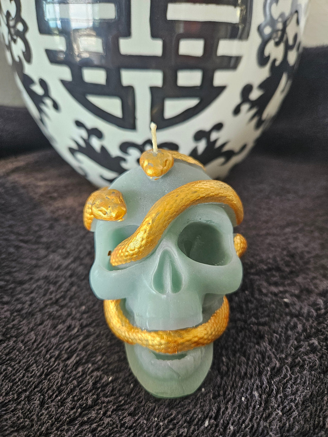 Serpent skull candles