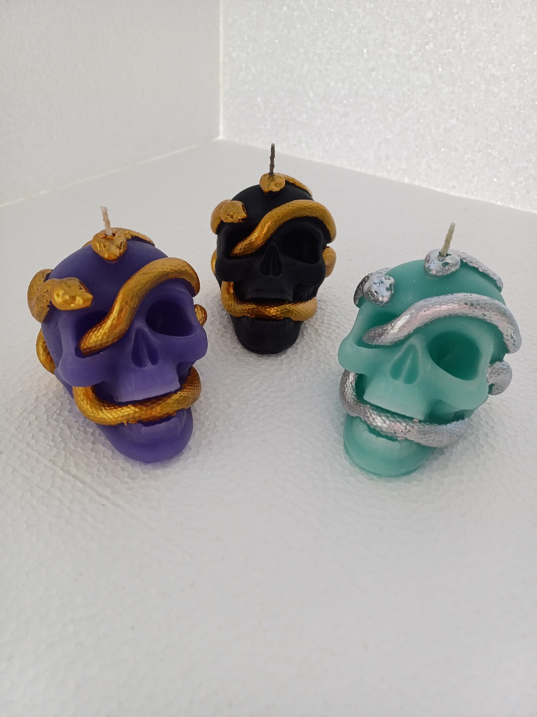 Serpent skull candles