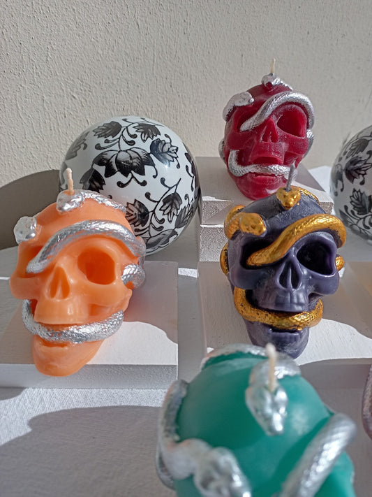 Serpent skull candles