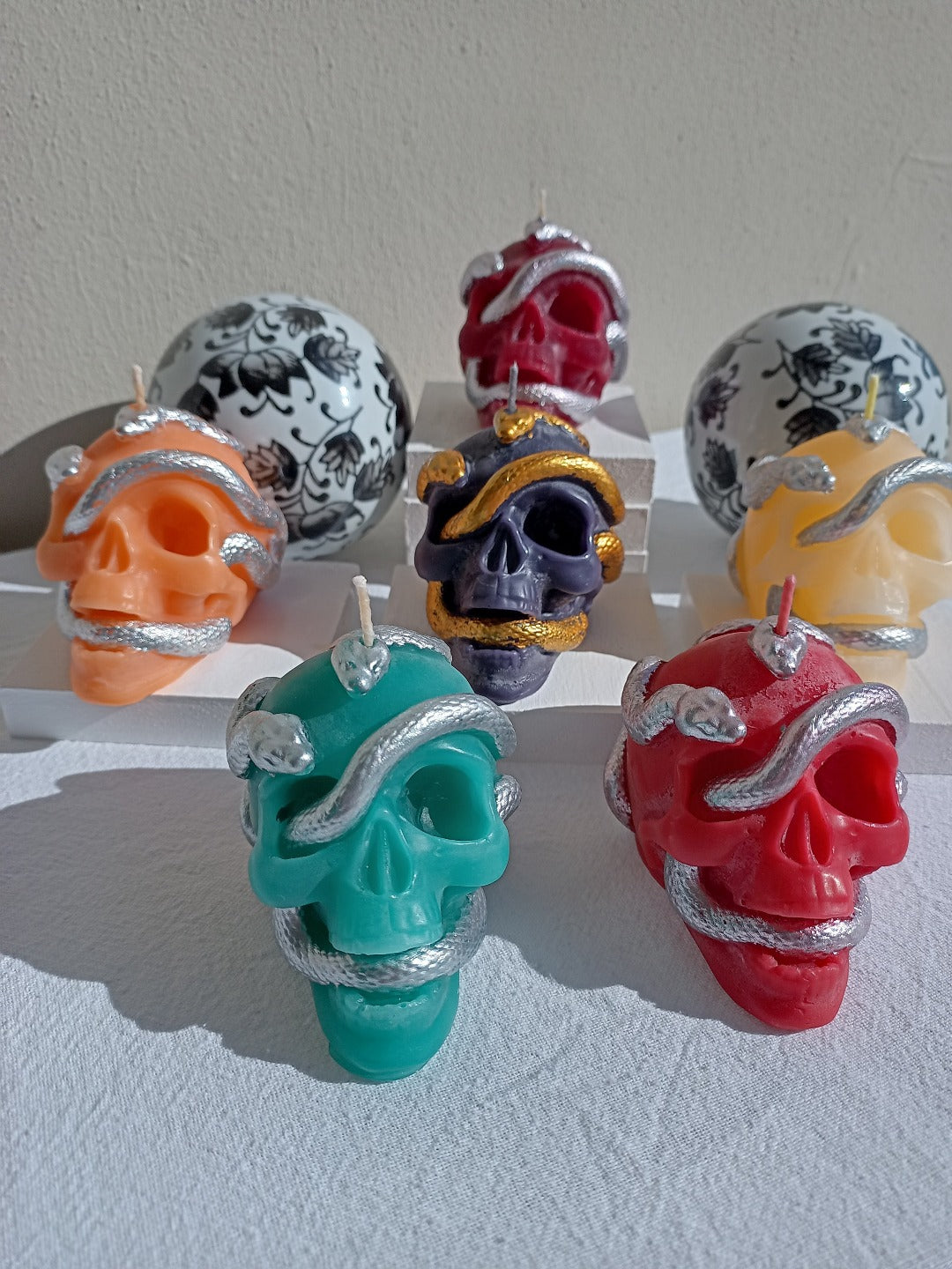 Serpent skull candles