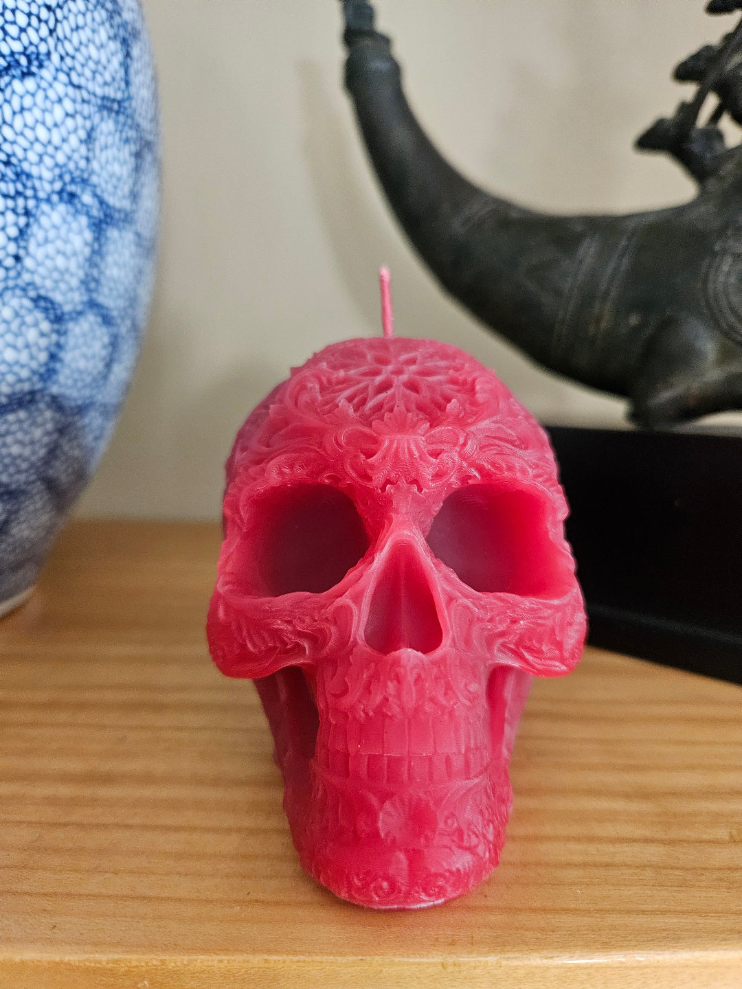 Star forehead skull candles with intricate detail