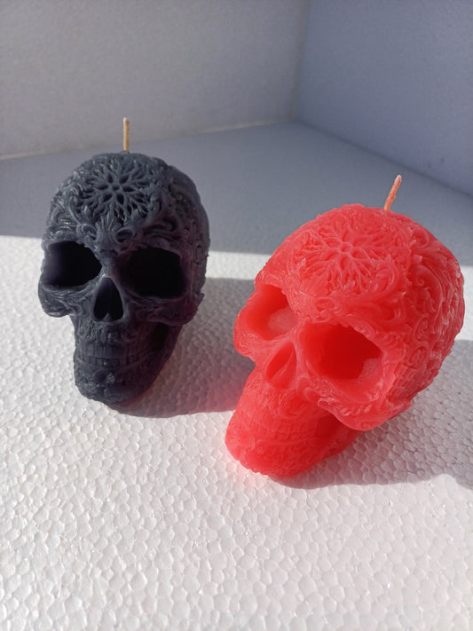 Star forehead skull candles with intricate detail