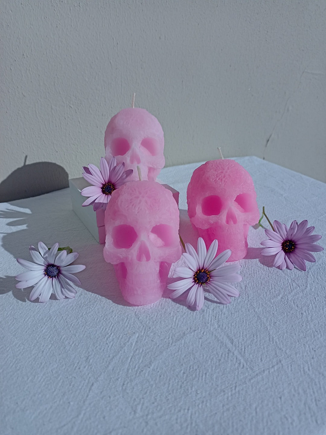 Star forehead skull candles with intricate detail