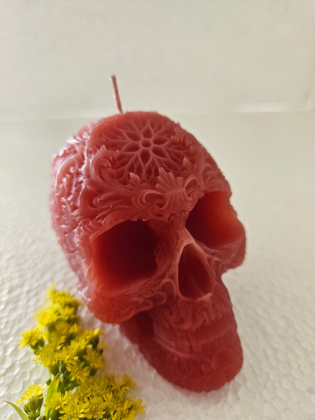 Star forehead skull candles with intricate detail