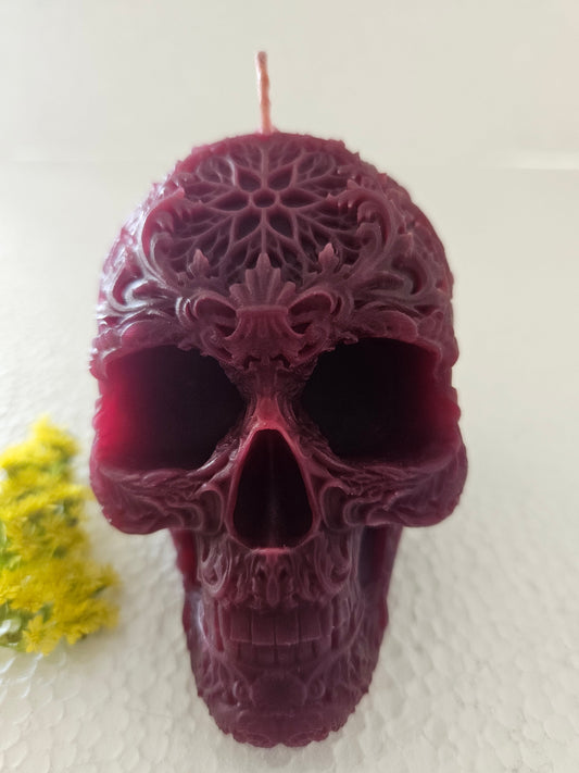 Star forehead skull candles with intricate detail