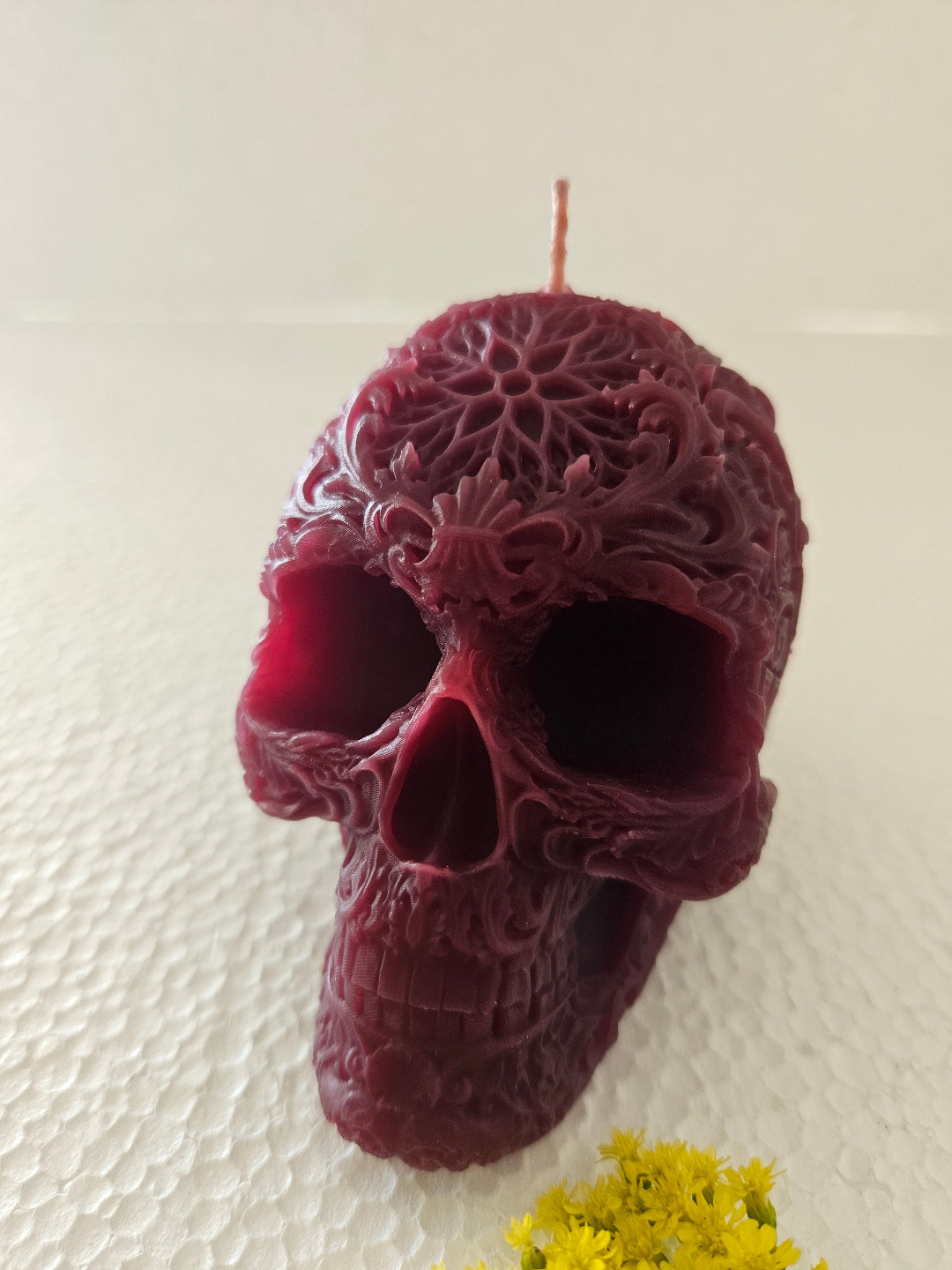 Star forehead skull candles with intricate detail